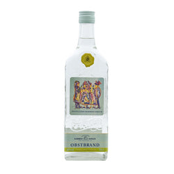 Eine Flasche Obstbrand von der Destillerie Kammer-Kirsch mit einem farbenfrohen Etikett.