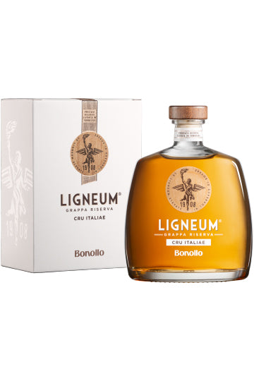 Flasche Ligneum Grappa Riserva von Bonollo neben der passenden Verpackung.