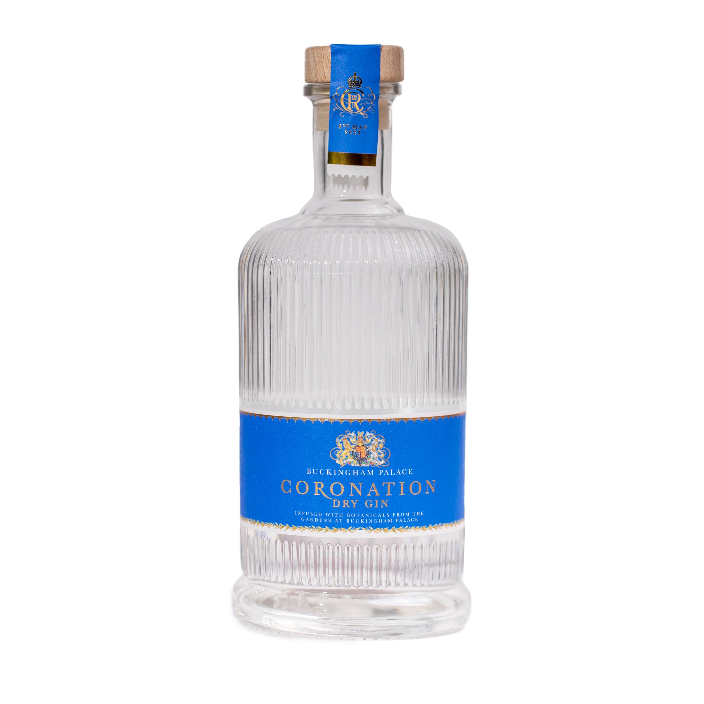 Eine Flasche Buckingham Palace Coronation Dry Gin mit blauer Etikettierung und Holzverschluss.