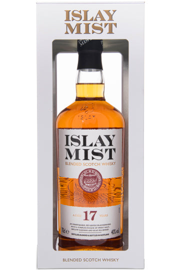 Eine Flasche Islay Mist 17 Jahre alter Blended Scotch Whisky in einer weißen Verpackung.