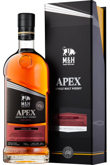 Eine Flasche M&H Apex Single Malt Whisky neben ihrer Verpackung.