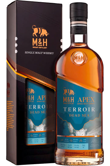 Eine Flasche Single Malt Whisky "Apex" von M&H vor einer passenden Verpackung.
