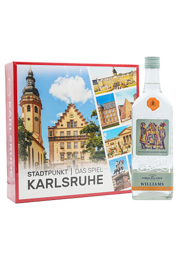 Brettspiel "Stadtpunkt Karlsruhe" mit einer Flasche Williams-Birnenbrand.