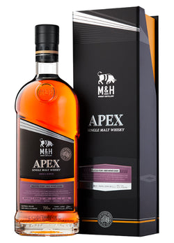 Eine Flasche M&H Apex Single Malt Whisky neben ihrer Verpackung.