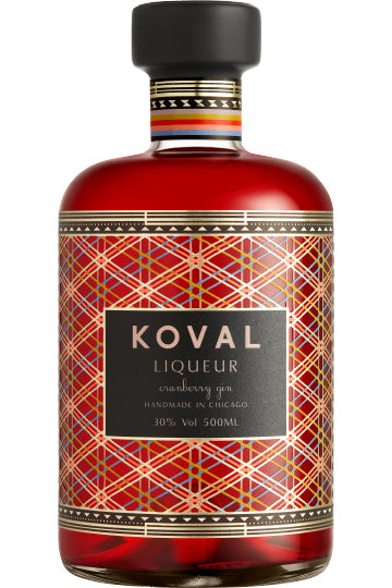 Flasche Koval Cranberry Gin Likör mit buntem geometrischem Muster und schwarzem Etikett.