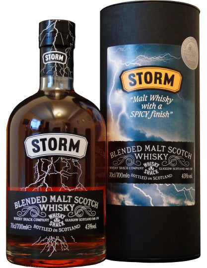 Storm Blended Malt Scotch Whisky mit Flasche und Verpackung, gestaltet mit Blitzmotiv und Informationen zur Abfüllung.